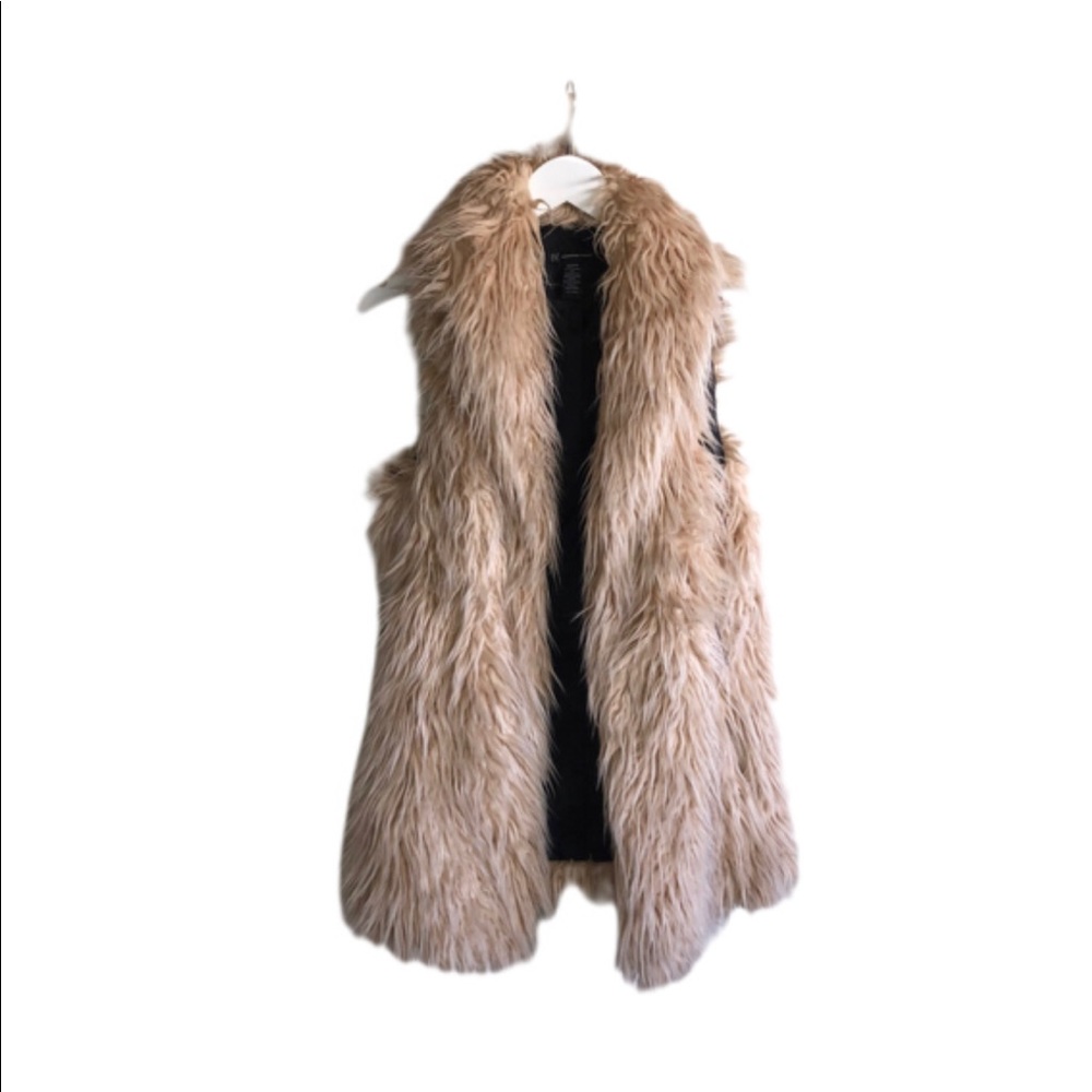 Inc International Concepts faux fur. Color is off-white / cream. Size medium.